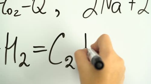Hand Writing Math Equation on Whiteboard