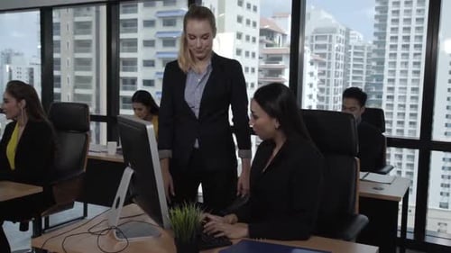 Young Leader Gives Advice to Young Woman Worker