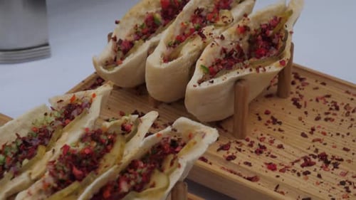 Pita Bread Halves Filled with Salad and Meat