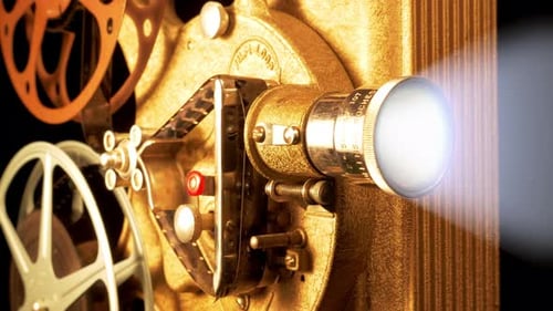 Close Up of Vintage Film Projector Shining Light