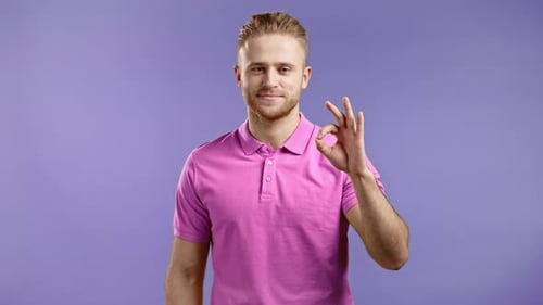 Man Gives OK Hand Gesture