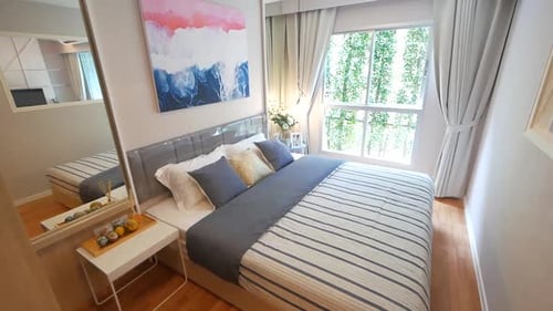 Modern Bedroom Interior with Natural Light and Decor