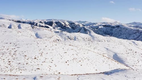 Winter in Nature Where Mountain Ranges and Peaks are Covered with Snow and Ice
