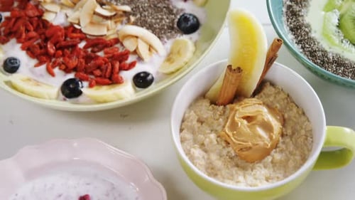 Overhead View of Bowls with a Variety of Breakfasts