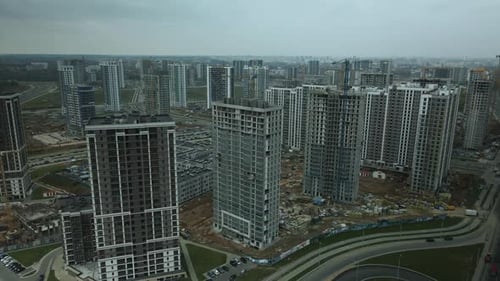 Construction of modern multi-storey buildings. Construction of a new city block.