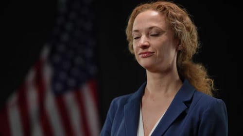 Woman Smiling with American Flag Background