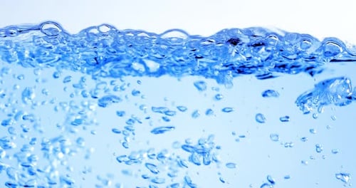 Many Bubbles in Water Close Up Abstract Water Wave with Bubbles in Slow Motion