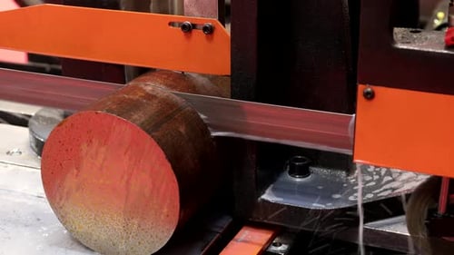 Band Saw Cutting Metal Rod with Water