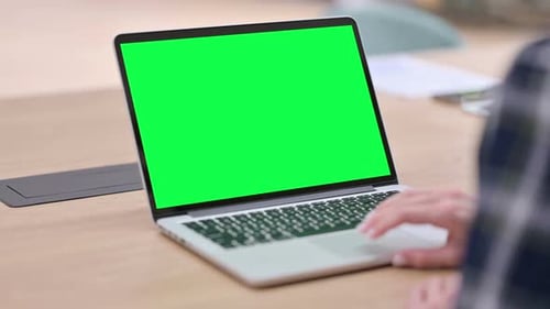 Female Hands Using Laptop with Green Chroma Key Screen