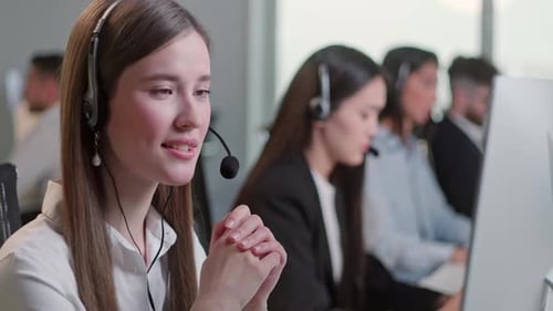 Close Up Portrait of Woman a Technical Customer Support Specialist Talking on a Headset While