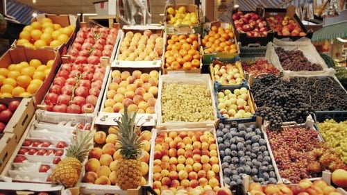Exotic fruits and organic vegetables on sale in the farmers market. Vegetables and fruits on sale.