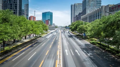 Time lapse of busy traffic and modern buildings in Beijing city , China.