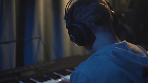 Teenager at Home Composes Music In His Home Sound Studio