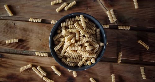 Fusilli Pasta Dry on the Table Slowly Rotates.