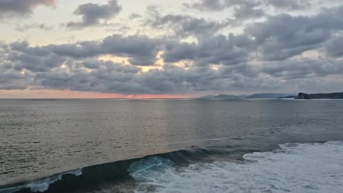 Majestic Ocean Horizon View and Orange Skies During Sunrise, Indonesia