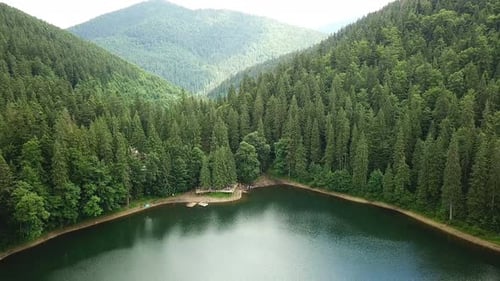 Lake Among The Carpathian Mountains From The Height Of Bird Flight