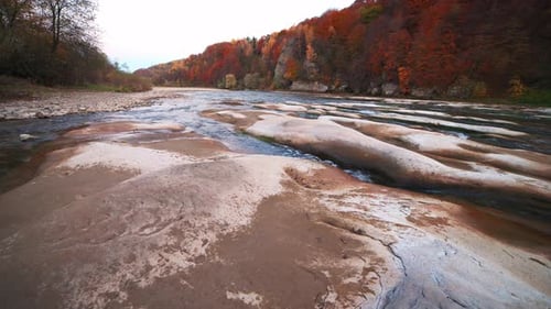 Slider Pan Realtime Video River Rapids with Autumn Forests on Banks