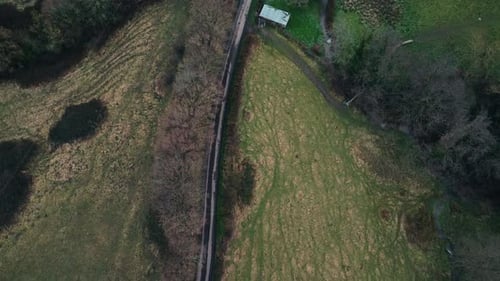 Dusk Dawn Aerial Drone Countryside Runner With Dog Birds Eye Road