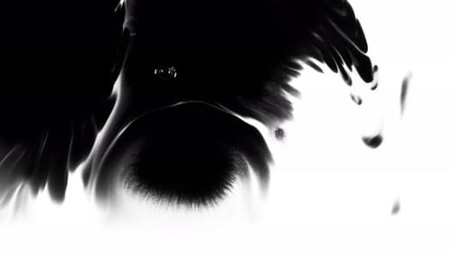 Black Ink Spreading on White Abstract Background