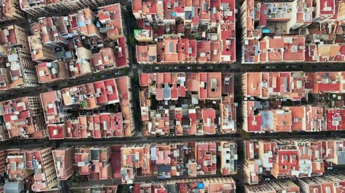 Aerial drone view of Barcelona, Spain. Blocks with multiple residential buildings, streets
