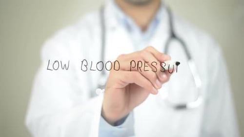 Low Blood Pressure, Doctor Writing on Transparent Screen