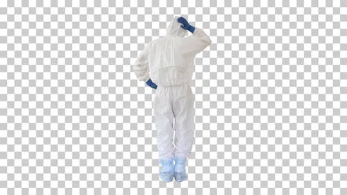 Homme dans une combinaison de décontamination blanche mettant, Alpha Channel