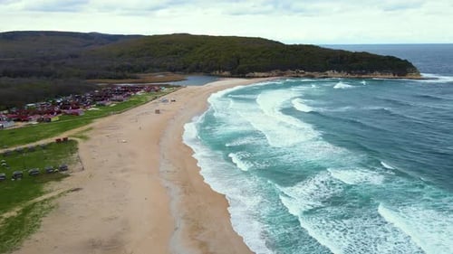 High and powerful waves coming fast to the beach, waves in winter day