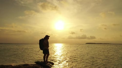 Girl enjoys life on relaxing lagoon beach adventure by blue water and white sandy background of the