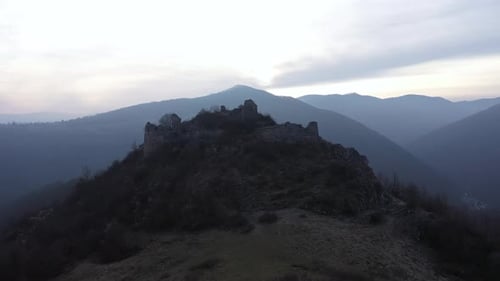Flying Above Medieval Fortress Ruins, Aerial View of a Stronghold