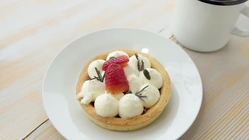 Closeup Dessert on a Plate. Beautiful Cakes on Wooden Background