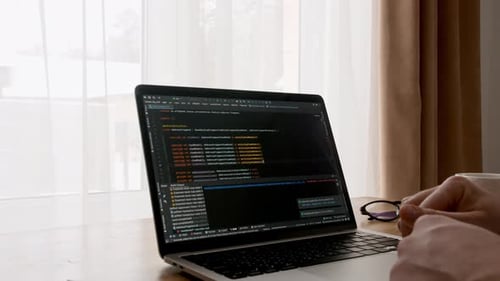 Coding on the Screen HTML Encoding and Programming on a Laptop Screen Developer Web Development