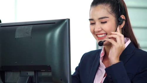 Business People Wearing Headset Working in Office