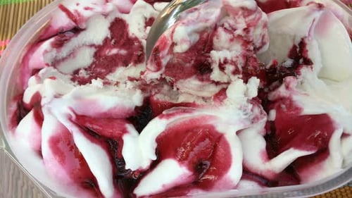 Spoon Scooping Berry Ice Cream