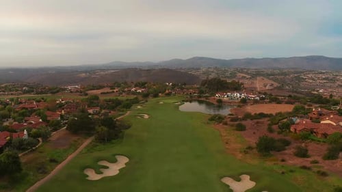 Millionaires luxurious mansions with a golf course seen from above