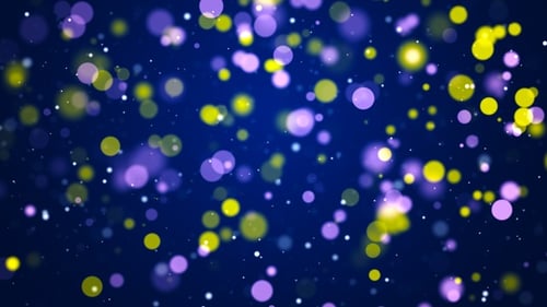 Abstract Floating Purple Yellow Bokeh Lights Background