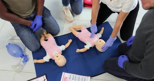 CPR Training on Baby Medical Dummies