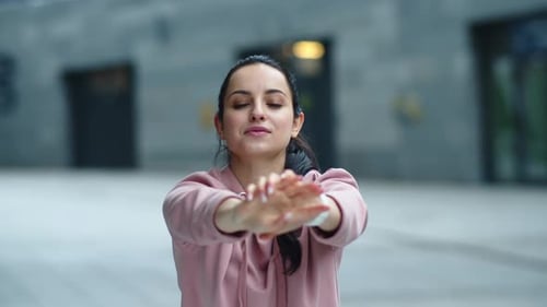 Close Up Sport Woman Stretching Arms Outdoor . Fitness Girl Warming Up