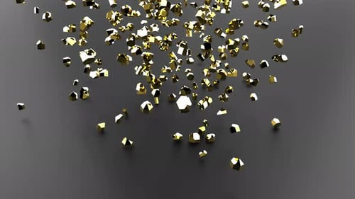 Goldene Steine fallen auf schwarze Oberflächen, Superzeitlupe, 1000 Bilder pro Sekunde