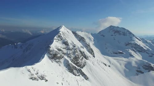 Scenic Aerial View of Snow Capped Mountains