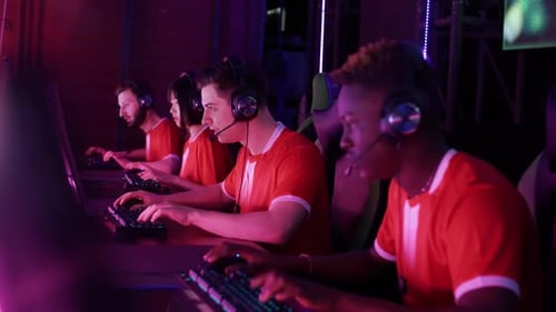 eSports Team Celebrates Victory in Gaming Arena