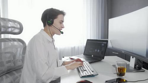 Attractive Young Woman Working at Call Center