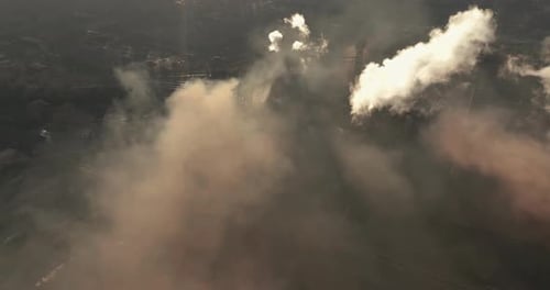 Air Pollution. Clouds of Smoke Coming From the Chimneys of the Plant. Drone Flying Over Smoking