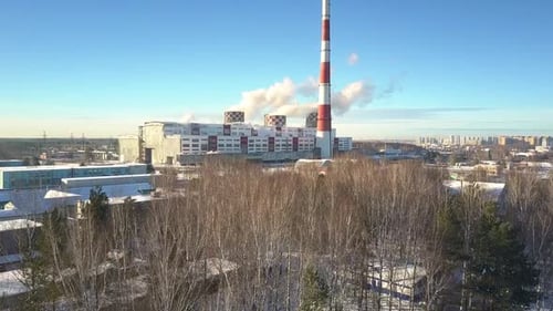Bird Eye View From Winter Wood To Heating Plant with Towers
