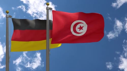 Realistic Waving Flags: Germany and Tunisia Against Blue Sky