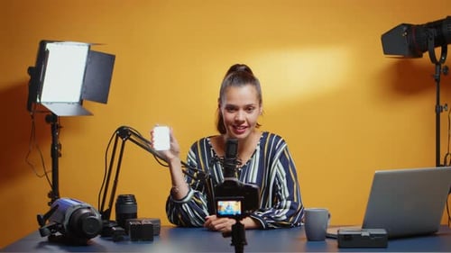Woman Reviews Video Lighting in Home Studio