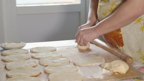 Roll Out the Dough on a Wooden Board