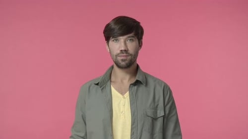 Man Makes Funny Face, Points Fingers Forward