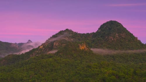 Beautiful aerial view sea of fog in the morning forest on mountain.