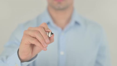 Man Writes Theme Design On Glass