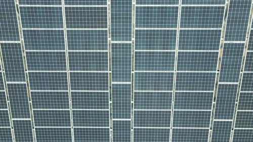 Close Up Top View on Solar Panel. Panorama of Solar Panels From a Quadcopter. Background or Texture